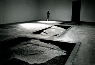 Michael Heizer, Ace Gallery New York, 1994 This exhibition was installed at the same time the 17,000 square foot gallery was under construction.  The pits were excavated and lined with concrete for boulders weighing up to 49,000 pounds